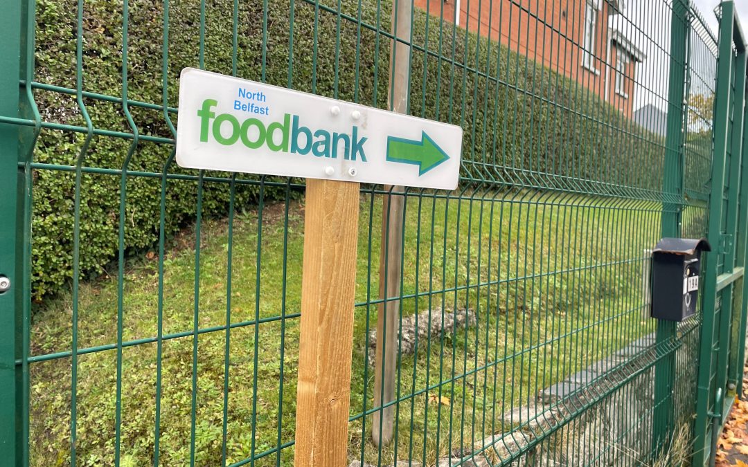 Sign pointing to North Belfast Foodbank